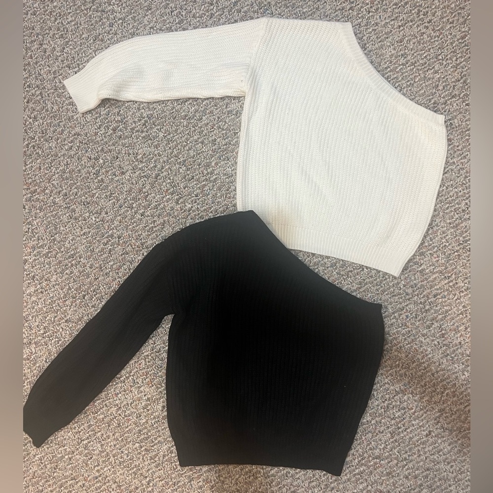Adika One shoulder sweaters in white and black